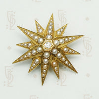 18k gold victorian star pin/pendant set with 1/2 pear;s and an omc diamond