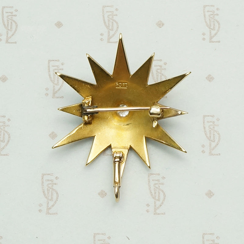 18k gold victorian star pin/pendant set with 1/2 pear;s and an omc diamond