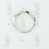Flat side view of the recycled 14k white gold 5 diamond wave band showing flat back and wave front