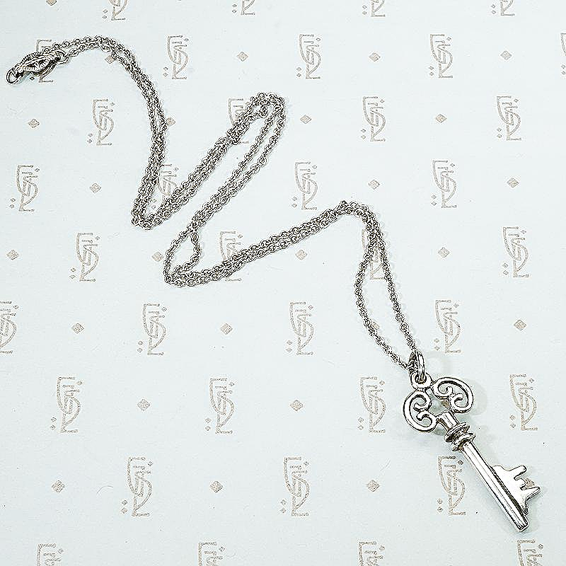 Sweet Scrolled Silver Key Pendant