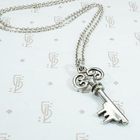 Sweet Scrolled Silver Key Pendant