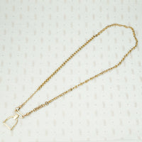 The Golden Stirrup Double Hook Necklace