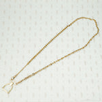 The Golden Stirrup Double Hook Necklace