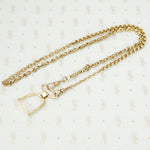 The Golden Stirrup Double Hook Necklace