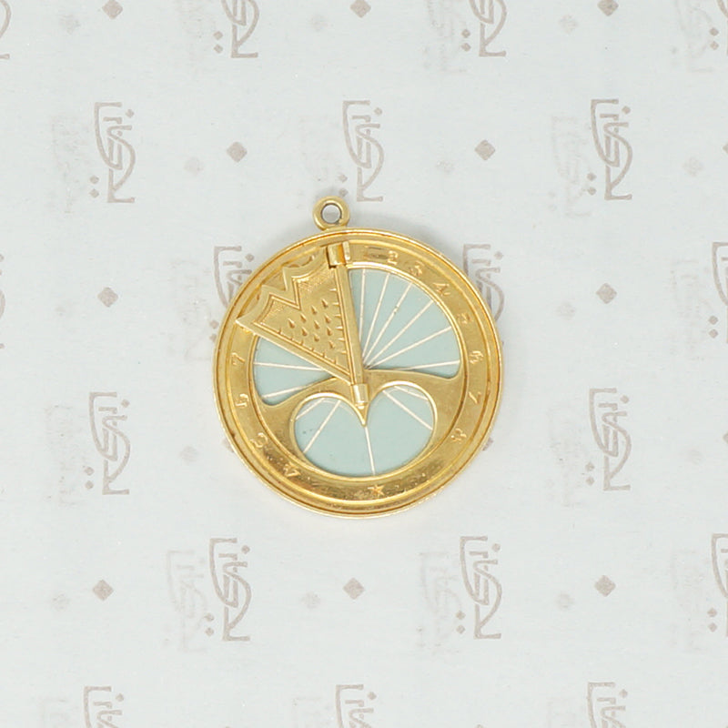 gübelin 18k sundial pendant