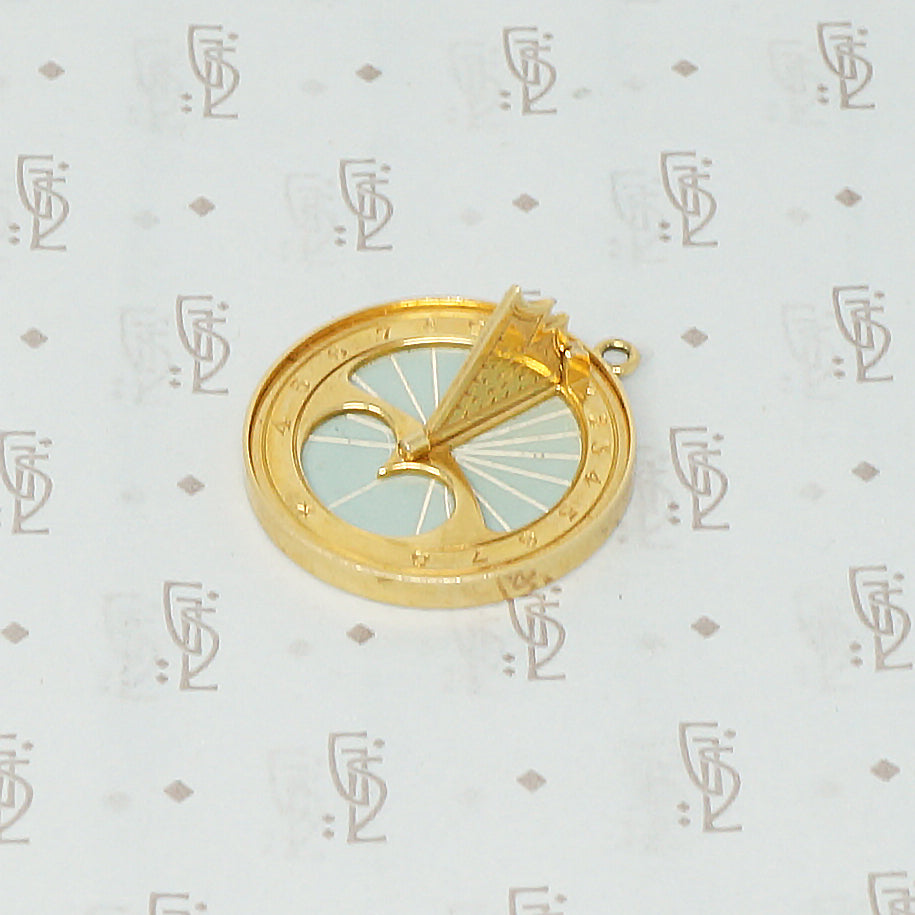 gübelin 18k sundial pendant