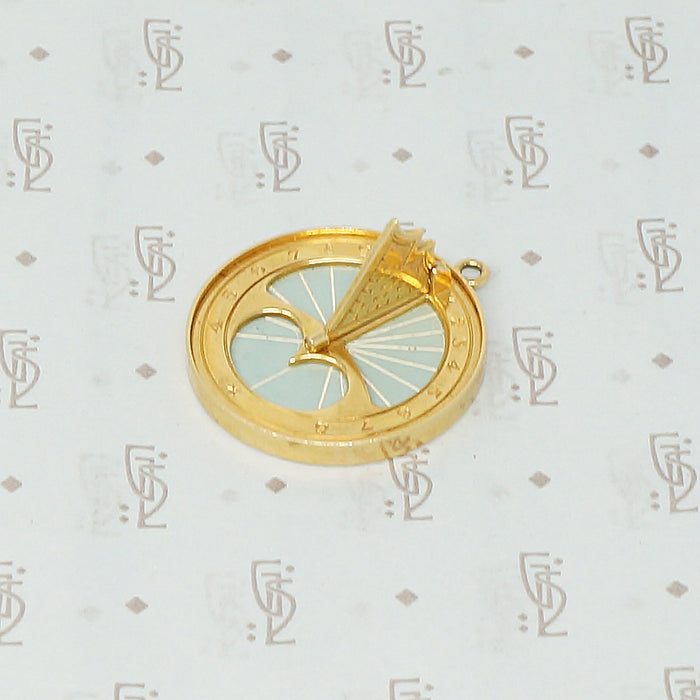gübelin 18k sundial pendant