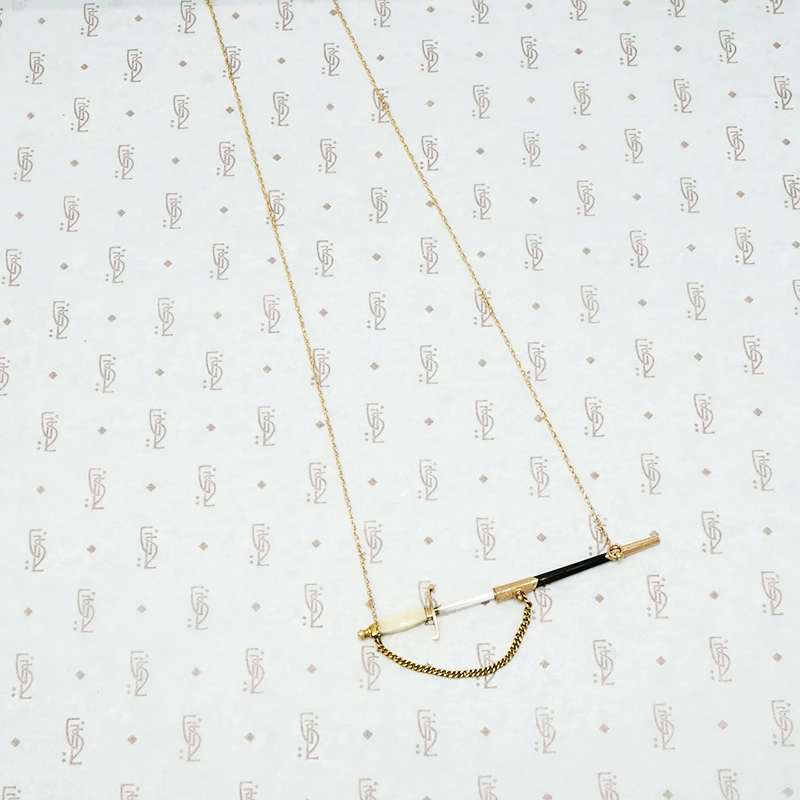 sword and scabbard necklace 14k gold ebony and bone