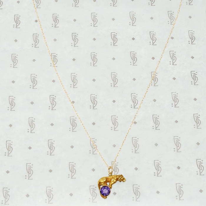 gold tiger on an amethyst ball alling & co