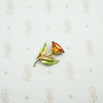 the tiniest luminous enamelflower brooch 14k with a wee pearl