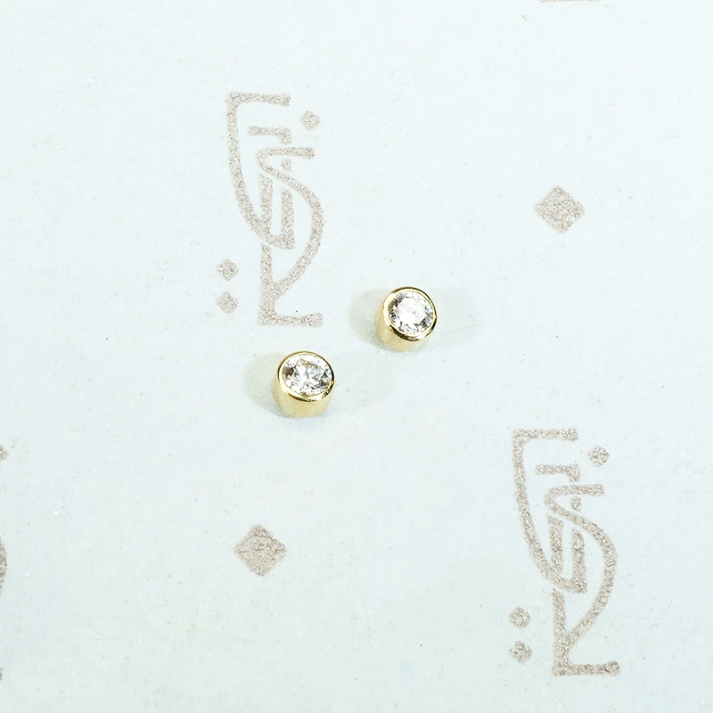 tiny 14k yellow gold bezel set diamond studs recycled