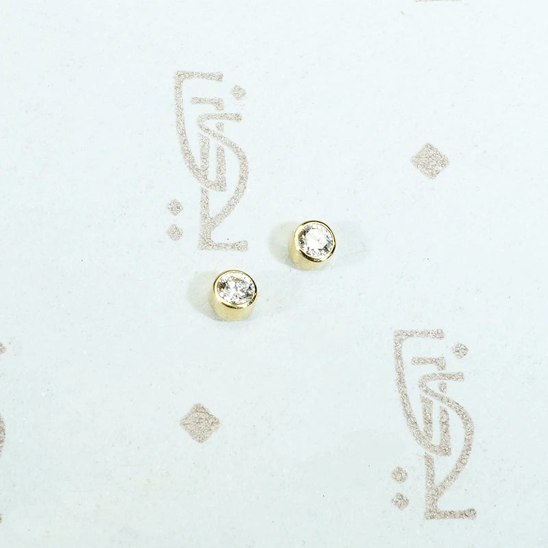 tiny 14k yellow gold bezel set diamond studs recycled