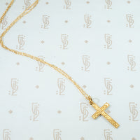 circa 1910 10k yellow gold cross on chain with engraved floral desin