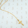 circa 1910 10k yellow gold cross on chain with engraved floral desin