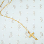 circa 1910 10k yellow gold cross on chain with engraved floral desin