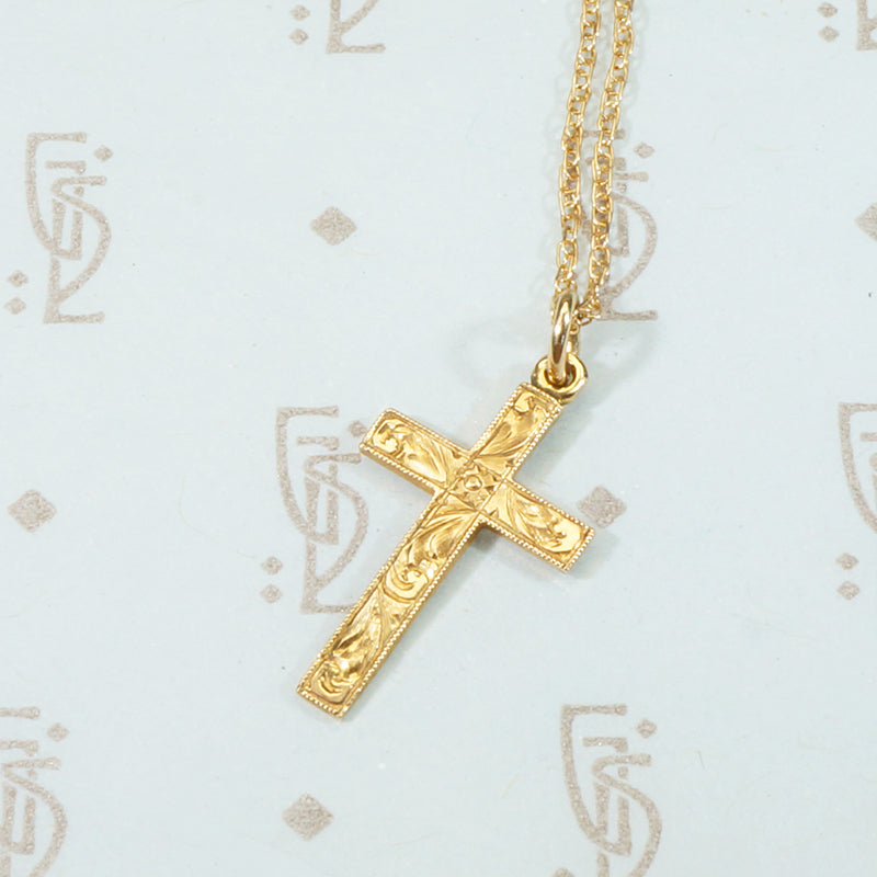 circa 1910 10k yellow gold cross on chain with engraved floral desin