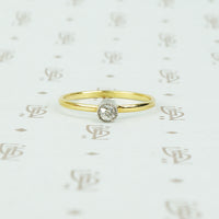 18k and platinum omc tiny diamond ring