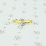 18k and platinum omc tiny diamond ring