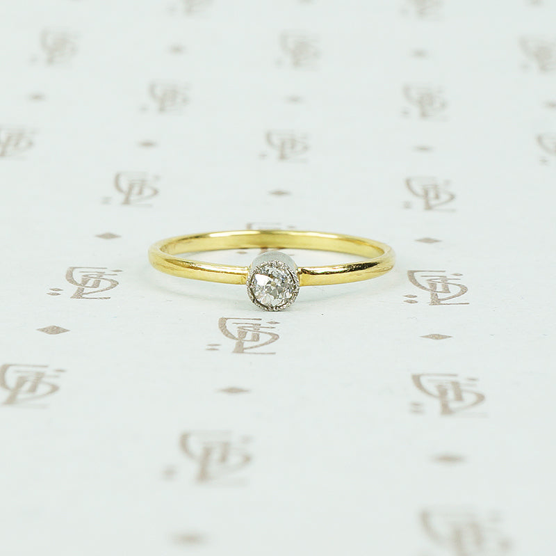 18k and platinum omc tiny diamond ring