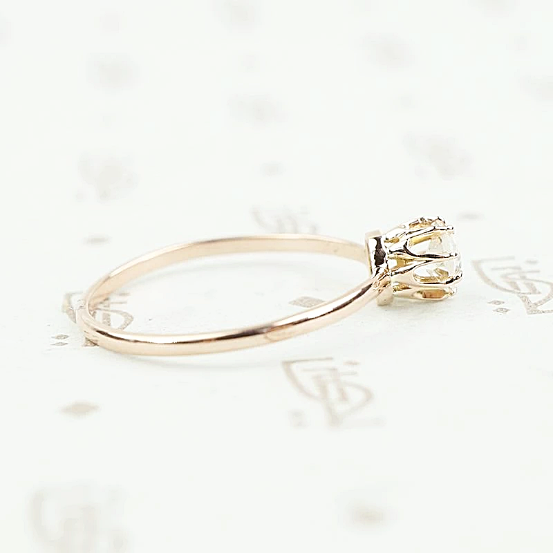 omc 1/4 carat solitaire side