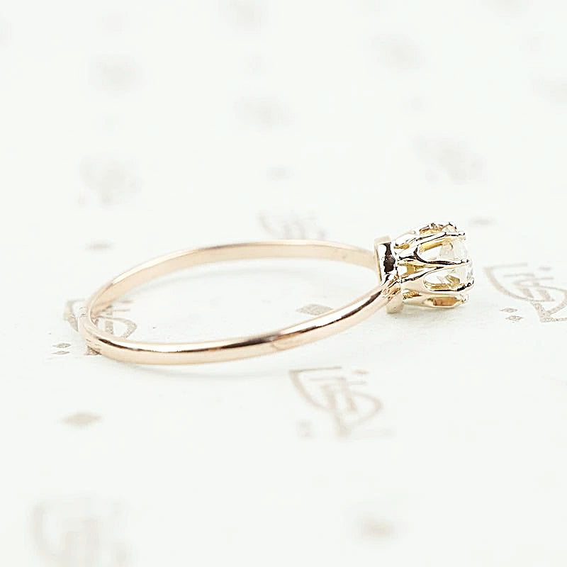 omc 1/4 carat solitaire side