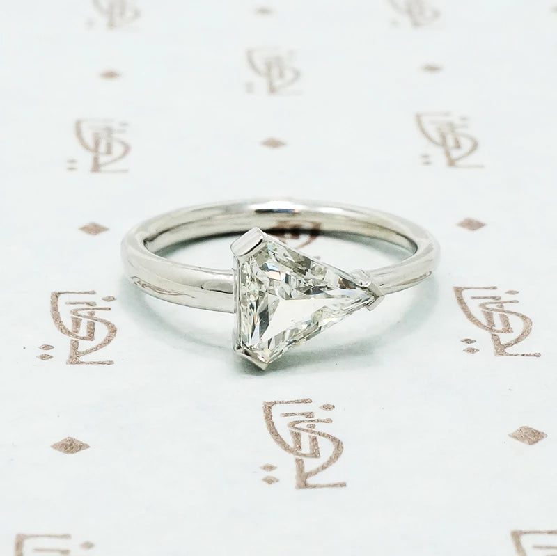 Shield Cut Diamond In Platinum Arrow Ring