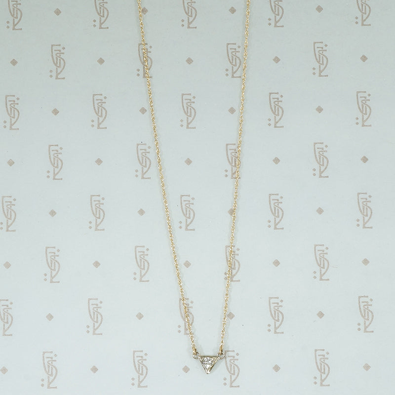 repourposed white gold diamond set triangle pendant on a recycled 14k yellow gold chain