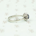 Mid Century Inky-Blue Sapphire Solitaire