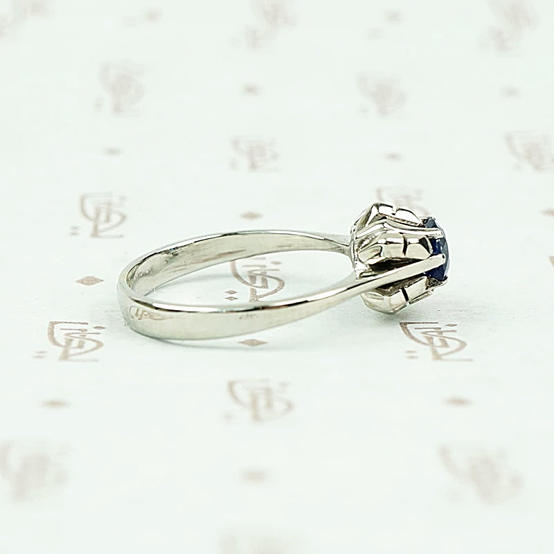 Mid Century Inky-Blue Sapphire Solitaire