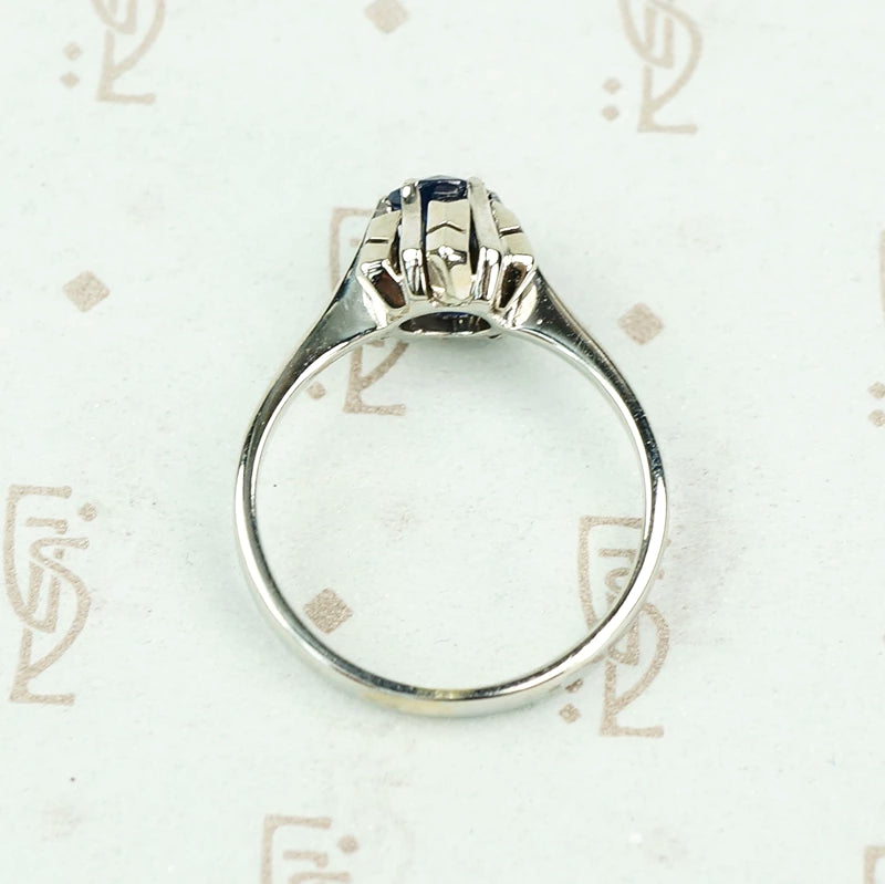 Mid Century Inky-Blue Sapphire Solitaire