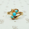 14k rose gold hungarian ring set with 3 bright blue natural turquoise stones