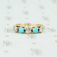 alternating diamond and turquoise band yellow gold prong setting