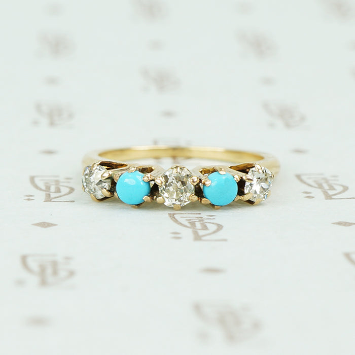 alternating diamond and turquoise band yellow gold prong setting