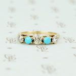 alternating diamond and turquoise band yellow gold prong setting
