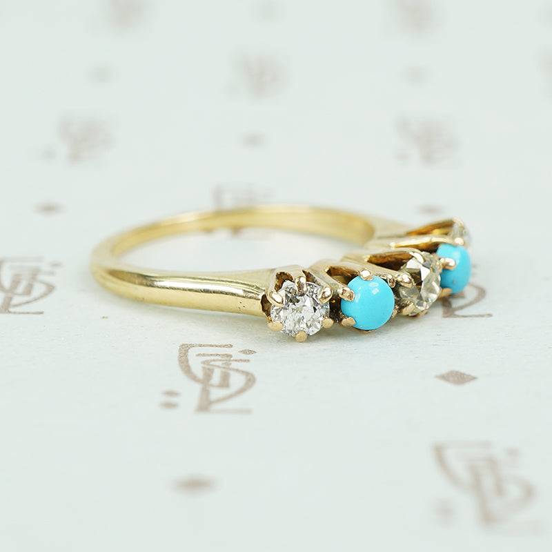 alternating diamond and turquoise band yellow gold prong setting