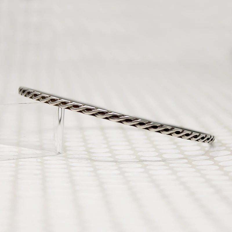 The Rope Twist Sterling Bangle from Allie B.
