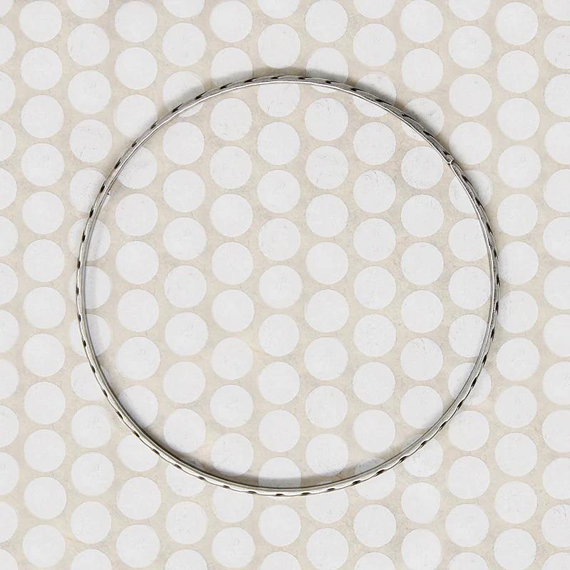 The Rope Twist Sterling Bangle from Allie B.