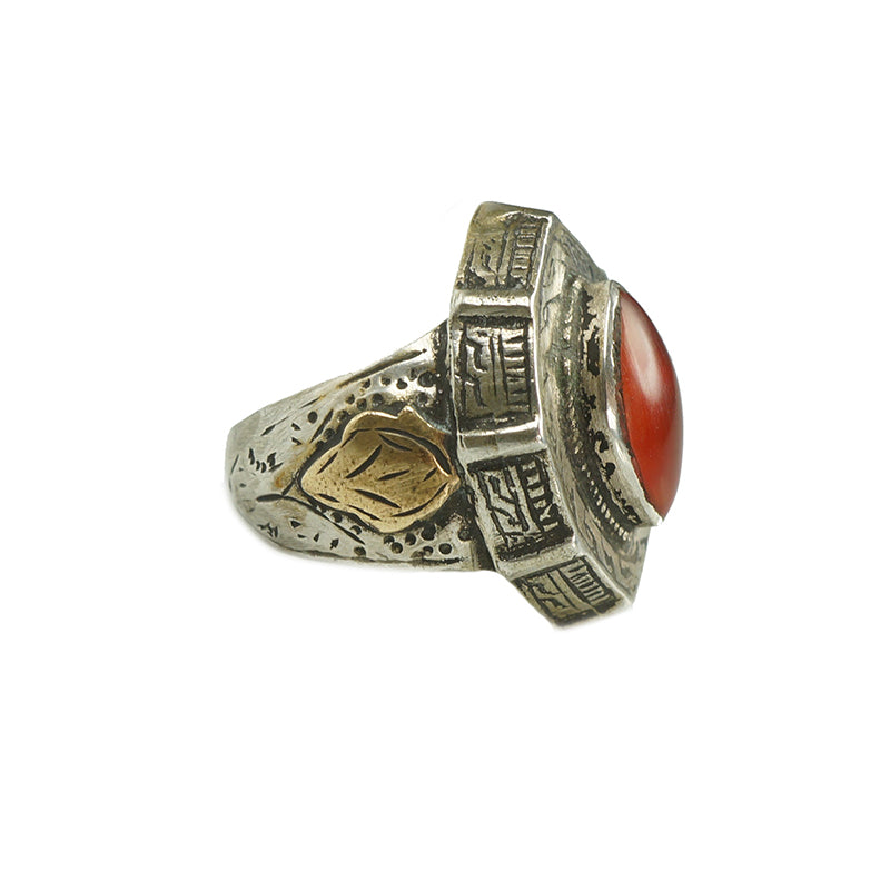 Tribal silver ring hand wrought engraves set with a carnelian stone