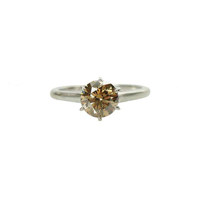 Vintage Platinum Engagement Ring with a Fancy Colored Diamond