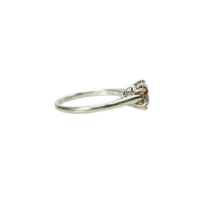 Vintage Platinum Engagement Ring with a Fancy Colored Diamond
