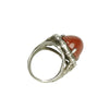 sterling silver ring with goldstone set in a bone shaped frame