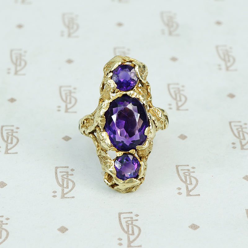 Among the Leaves a Walton and Co Amethyst and Green Gold Ring