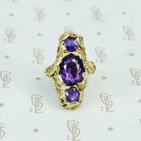 Among the Leaves a Walton and Co Amethyst and Green Gold Ring
