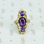 Among the Leaves a Walton and Co Amethyst and Green Gold Ring