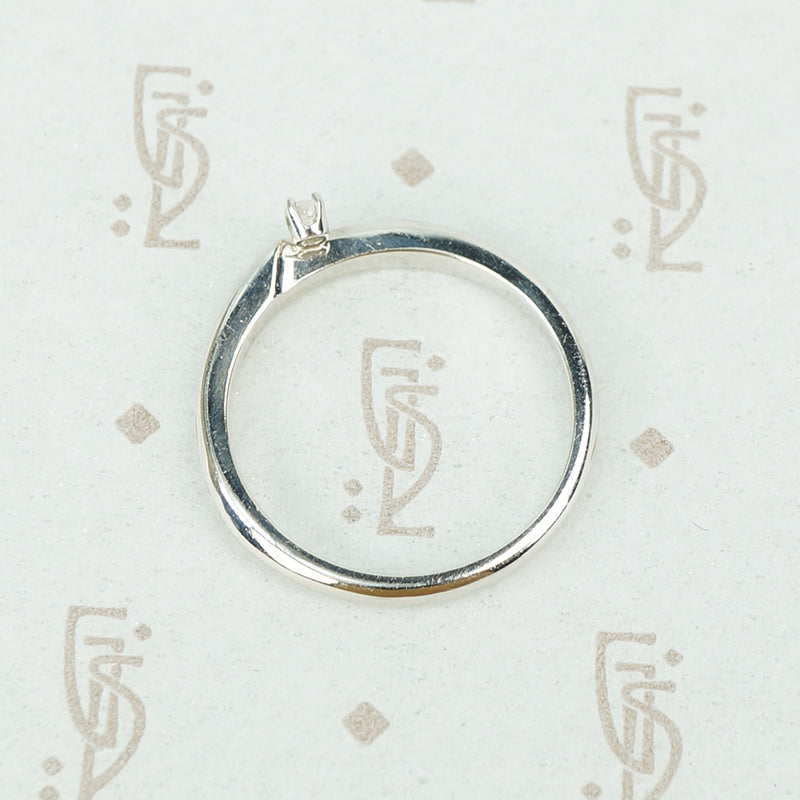 swirly white gold and diamond satelite ring side