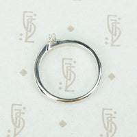 swirly white gold and diamond satelite ring side