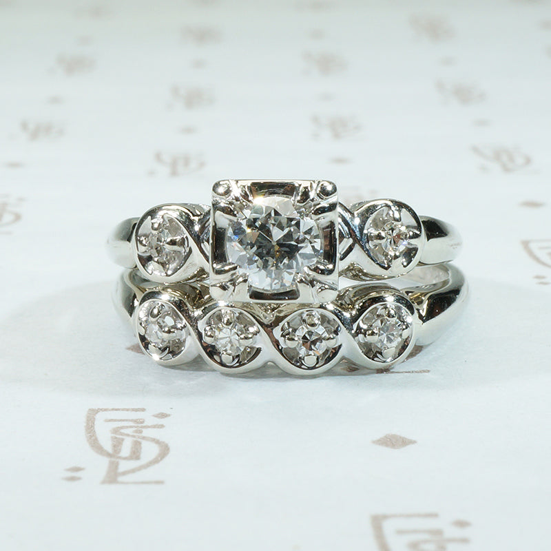 pretty 1950's vintage wedding set with oec center doamond and matching band