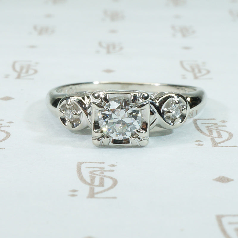 pretty 1950's vintage wedding set with oec center doamond and matching band