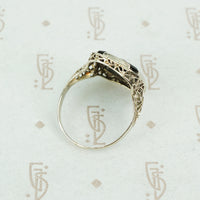 deco onyx and diamond ring in white gold filigree side view