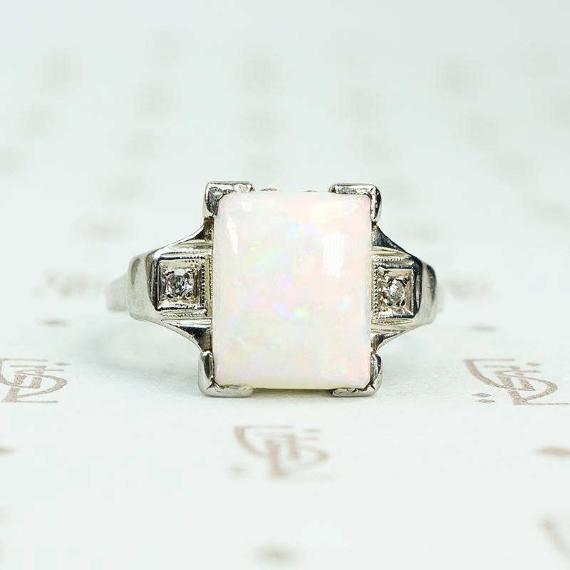 rectangular opal in white gold with diamond sides